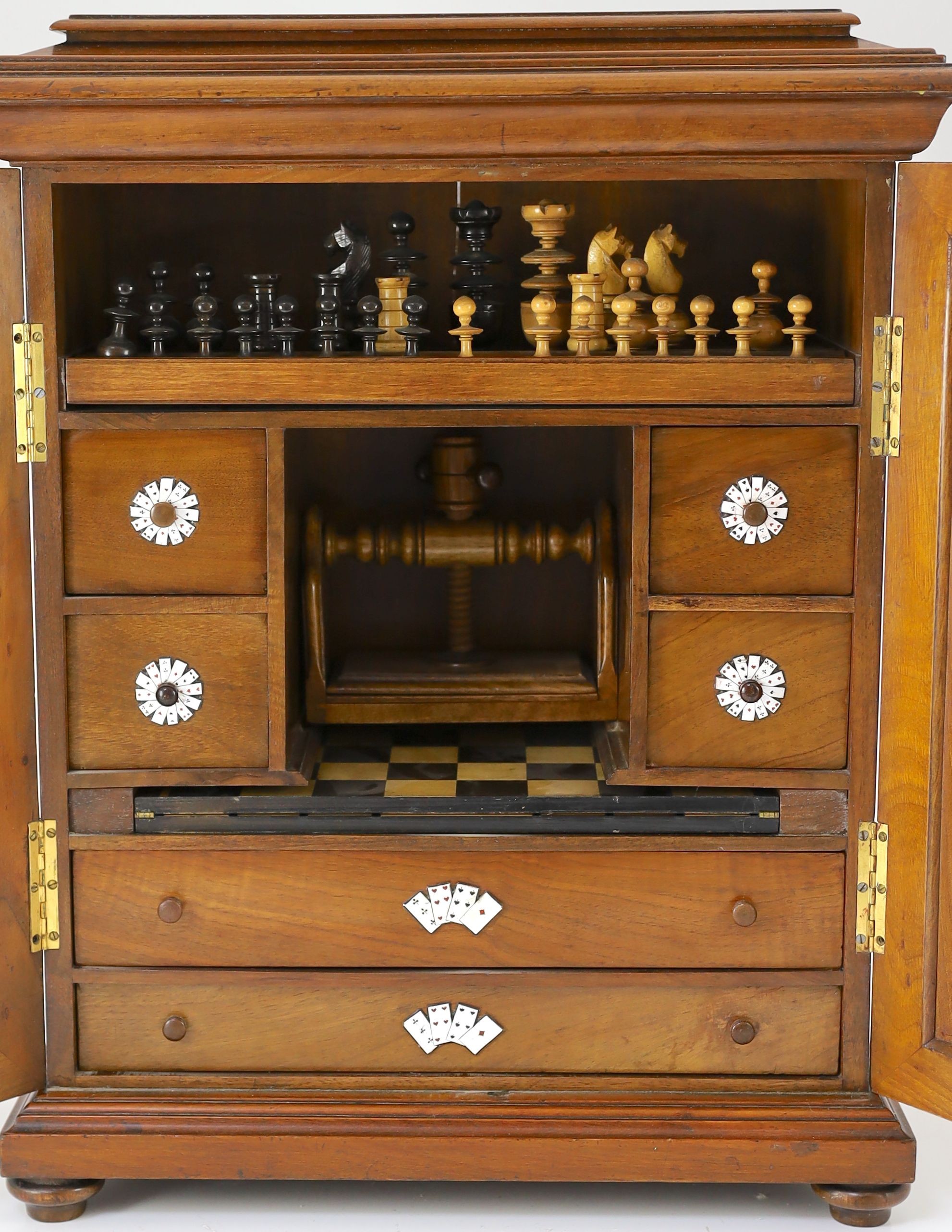 A late 19th century gilt metal mounted walnut games cabinet, W.40cm D.19cm H.49cm